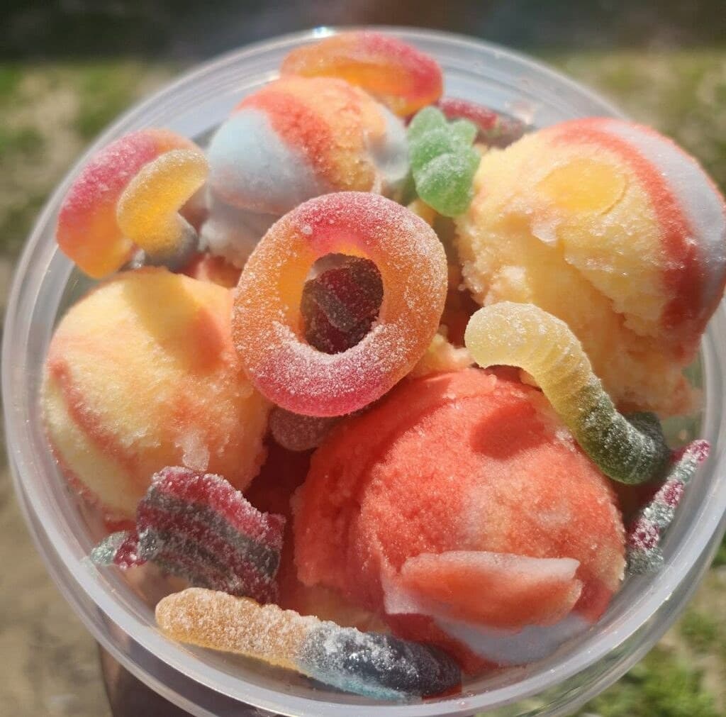 Tropical Fantasy water ice cup with bright candy toppings